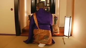 Couple being naughty in Buddhist temple