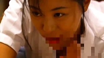 Asian bimbo sucks on a big cock close up