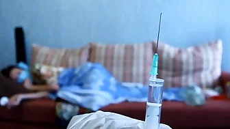 Asian ass receives an injection
