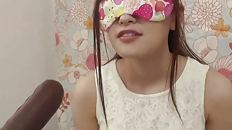 She'll win a prize if she can guess all the contents of the mouth with blindfolds!